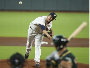 Houston Astros starting pitcher Zack Greinke delivers a pitch during the first inning against the Oakland Athletics in game two of a double header at Minute Maid Park.