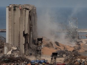 Bulldozers continue work at the base of the destroyed port silos on August 13, 2020 in Beirut, Lebanon.