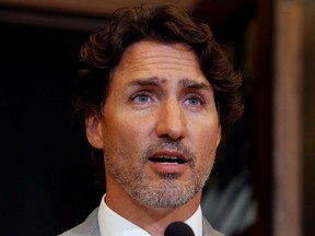 Canadian Prime Minister Justin Trudeau speaks to reporters on Parliament Hill in Ottawa, Ontario, Canada August 18, 2020.