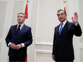 China's State Councillor Wang Yi meets with Canada's Foreign Minister Francois-Philippe Champagne in Rome, Italy, August 25, 2020.