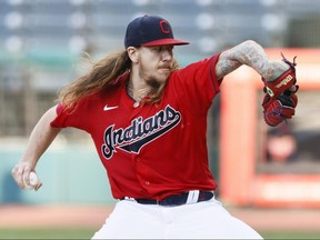 Starting pitcher Mike Clevinger of the Cleveland Indians throws against the Cincinnati Reds at Progressive Field on August 5, 2020 in Cleveland.