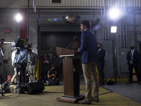 Prime Minister Justin Trudeau takes questions from the media during an announcement on N95 masks at a facility in Brockville, Ont., Friday, Aug. 21, 2020.