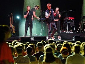 Singer Tim Bendzko performs for participants wearing FFP2 protective face masks at the RESTART-19 Covid transmission risk assessment study on August 22, 2020 in Leipzig, Germany.