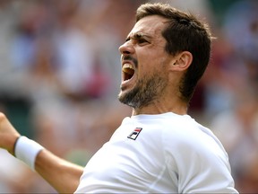 Guido Pella of Argentina celebrates victory in his Men's Singles third round match against Kevin Anderson of South Africa during Day five of The Championships - Wimbledon 2019 at All England Lawn Tennis and Croquet Club on July 05, 2019 in London, England.