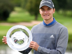 Rasmus Hojgaard of Denmark with the winners trophy after the final round of the ISPS HANDA UK Championship at The Belfry on August 30, 2020 in Sutton Coldfield, England.
