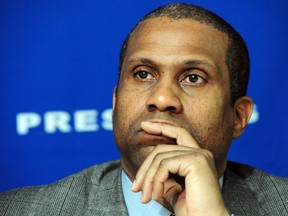 Talk show host, author and liberal political commentator,Tavis Smiley listens to speakers during  a “taking power back from banks for consumers, and the fight against poverty” event January 12, 2012 at the National Press Club in Washington, DC.