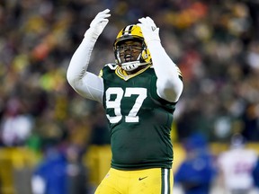 Kenny Clark of the Green Bay Packers reacts in the third quarter during the NFC Wild Card game against the New York Giants at Lambeau Field on January 8, 2017 in Green Bay, Wisconsin.