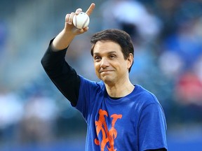 Actor Ralph Macchio throws out the ceremonial first pitch prior to the start of the game between the New York Mets and the Atlanta Braves at Citi Field on May 1, 2018 in the Flushing neighbourhood of the Queens borough of New York City.
