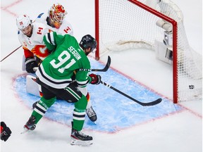 Dallas Stars centreman Tyler Seguin (No. 91) scores a goal against the Calgary Flames during the first period in Game 2 of the first round of the 2020 Stanley Cup Playoffs at Rogers Place.