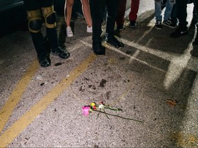 Demonstrators revisit the site where a man was murdered on August 26, 2020 in Kenosha, Wisconsin.