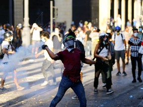 Demonstrators take part in a protest following Tuesday's blast, in Beirut, Lebanon August 9, 2020.