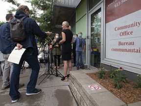 Infrastructure Minister Catherine McKenna speaks with the media outside her constituency office in Ottawa, Monday, Aug. 10, 2020.