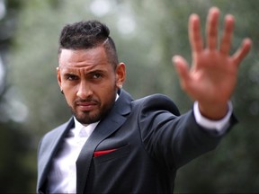 Nick Kyrgios acknowledges the fans as he arrives at Palais Eynard prior to the Laver Cup 2019 at Palexpo, on September 18, 2019 in Geneva, Switzerland.