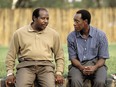 Paul Rusesabagina and Don Cheadle in Hotel Rwanda.