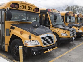Scores of parents across Quebec are voicing their concerns around the government's intention to get all students from pre-school through Grade 9 to physically return to schools across the province at the end of the month. School buses are shown at a depot in Vaudreuil-Dorion, Que., west of Montreal, Sunday, May 10, 2020.