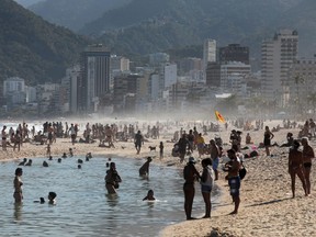 People enjoy Ipanema beach, amid the outbreak of the coronavirus disease (COVID-19), in Rio de Janeiro, August 9, 2020.