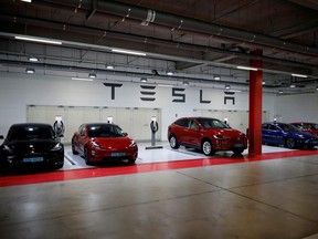 Tesla electric vehicles for test driving are parked in Hanam, South Korea, July 6, 2020.