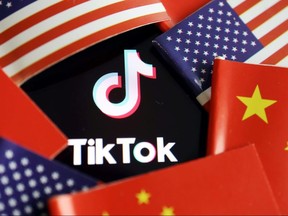 China and U.S. flags are seen near a TikTok logo in this illustration picture taken July 16, 2020.