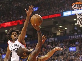 Cleveland's Kyrie Irving against  Toronto Raptors Lucas Nogueira as the Raptos lost 116-112 to the Cleveland Cavaliers in Toronto, Ont. on Monday December 5, 2016.