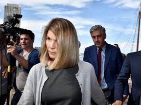 Actress Lori Loughlin leaves the federal courthouse after a hearing on charges in a nationwide college admissions cheating scheme in Boston, Massachusetts, U.S., August 27, 2019.