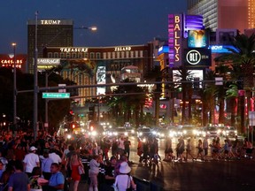 Tourists enjoy the Las Vegas Strip as they visit Las Vegas, Nevada, Aug. 27, 2018.