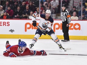 Connor McDavid of the Edmonton Oilers skates around Cale Fleury of the Montreal Canadiens during the first period at the Bell Centre on Jan. 9, 2020, in Montreal.