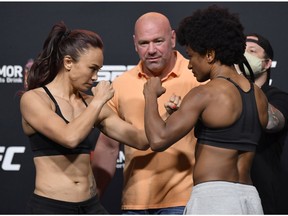 LAS VEGAS, NEVADA - SEPTEMBER 11: In this handout image provided by UFC, (L-R) Opponents Michelle Waterson and Angela Hill face off during the UFC Fight Night weigh-in at UFC APEX on September 11, 2020 in Las Vegas, Nevada.