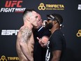 Colby Covington, left, and Tyron Woodley face off during the UFC Fight Night weigh-in at UFC APEX on Sept. 18, 2020 in Las Vegas. Chris Unger/Zuffa LLC via Getty Images
