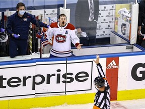 The Canadiens’ Brendan Gallagher, with a bloody mouth, complains to the referee in the third period about no penalty being called during Game 5 of the playoff series against the Philadelphia Flyers Aug. 19 at Toronto’s Scotiabank Arena.