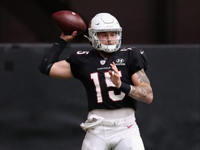 Quarterback Chris Streveler of the Arizona Cardinals throws a pass during a NFL team training camp at State Farm Stadium on Sept. 2 in Glendale, Ariz.