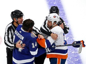 Pat Maroon #14 of the Tampa Bay Lightning and Matt Martin #17 of the New York Islanders scuffle during the second period in Game 2 of the Eastern Conference Final during the 2020 NHL Stanley Cup Playoffs at Rogers Place on September 09, 2020.