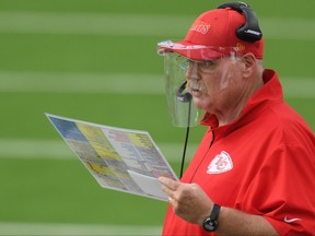 Head coach Andy Reid of the Kansas City Chiefs wears a face shield as he looks on from the sideline against the Los Angeles Chargers during the third quarter at SoFi Stadium on Sept. 20, 2020 in Inglewood, Calif.