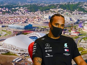 Pole position qualifier Lewis Hamilton of Great Britain and Mercedes GP talks in a press conference after qualifying ahead of the F1 Grand Prix of Russia at Sochi Autodrom on Sept. 26, 2020 in Sochi, Russia.