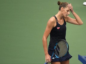 Karolina Pliskova of Czech Republic reacts while walking to her player's chair for a changeover after losing a game against Caroline Garcia of France (not pictured) on Day 3 of the 2020 U.S. Open tennis tournament at USTA Billie Jean King National Tennis Center in Flushing Meadows, New York, Sept. 2, 2020.