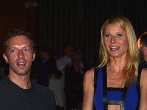 Singer/Songwriter Chris Martin (L) and actress Gwyneth Paltrow attend Hollywood Stands Up To Cancer Event with contributors American Cancer Society and Bristol Myers Squibb hosted by Jim Toth and Reese Witherspoon and the Entertainment Industry Foundation on Tuesday, January 28, 2014 in Culver City, California.