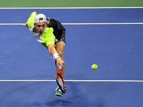 Denis Shapovalov of Canada hits the ball against Pablo Carreno Busta of Spain in the menÕs singles quarter-finals match on day nine of the 2020 U.S. Open tennis tournament at USTA Billie Jean King National Tennis Center on Sept 8, 2020.