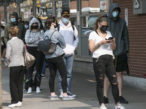 People line up at the COVID-19 Assessment Centre at Bathurst and Dundas Sts. on September 15, 2020.