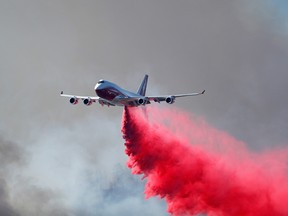 The Global Supertanker drops retardant ahead of the Glass Fire in Angwin, California September 27, 2020.