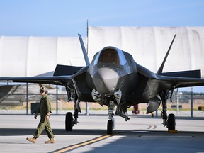 Ground crew manoeuvre the F-35B Lightning II fifth generation multi role combat aircraft at Marine Corps Air Station Beaufort on March 8, 2016 in Beaufort, South Carolina.