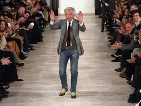 Designer Ralph Lauren greets the audience after presenting his creations during the Fall 2016 New York Fashion Week on Feb. 18, 2016, in New York.