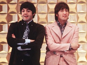 This photo taken on June 29, 1966 shows Beatles Paul McCartney and John Lennon.