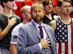 Brad Parscale, Trump 2020 re-election campaign manager, stands for the national anthem as U.S. President Donald Trump rallies with supporters in Southaven, Mississippi, October 2, 2018.