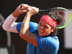 Milos Raonic of Canada plays a backhand in his match against Dusan Lajovic of Serbia during the Internazionali BNL d'Italia at Foro Italico on September 17, 2020 in Rome.