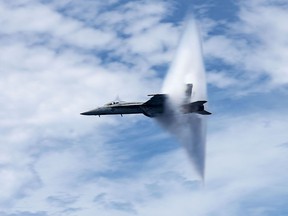 This US Navy handout photo obtained August 21, 2017 shows an F/A-18E Super Hornet as it breaks the sound barrier on August 20, 2017 over the Atlantic Ocean.
