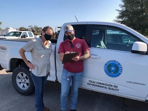 Investigators from the Texas Commission on Environmental Quality are present to conduct water sampling after a brain-eating amoeba was detected in the water supply in Lake Jackson, Texas, September 26, 2020.