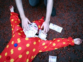 An Extinction Rebellion activist lies on the ground during a protest in London, Britain September 3, 2020.