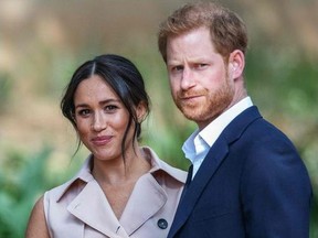 Britain's Prince Harry, Duke of Sussex and Meghan, the Duchess of Sussex arrive at the British High Commissioner residency in Johannesburg on October 2, 2019.