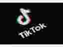 (FILES) This file illustration photo taken on May 27, 2020 This illustration picture shows the logo of the social network  application Tik Tok on the screen of a phone. - US President Donald Trump said on July 31, 2020 that he planned to bar the the fast-growing Chinese-owned social media app TikTok from operating in the United States. (Photo by Martin BUREAU / AFP)