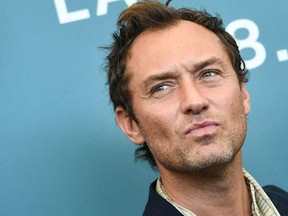 In this file photo British actor Jude Law attends a photocall for the upcoming television series "The New Pope" on September 1, 2019  presented out of competition during the 76th Venice Film Festival at Venice Lido.