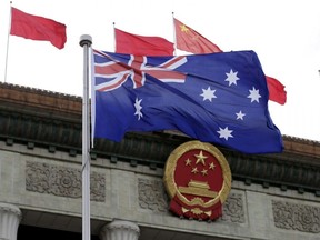 The Australian flag flutters in front of the Great Hall of the People in Beijing, China, April 14, 2016.